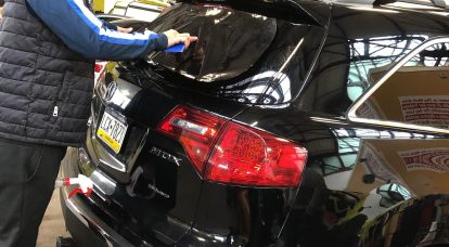 El Mundo Auto Repair Colocación de Papel Ahumado